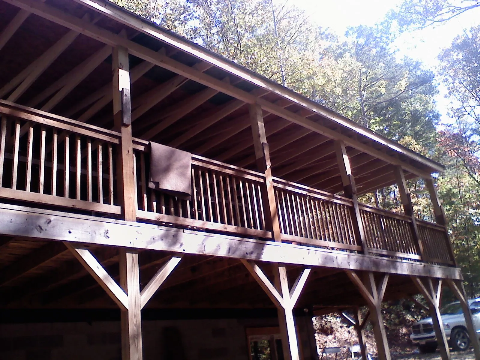 Timber framing under a new elevated porch and deck — Roof Leak Repair in Emington by Roofing Brothers